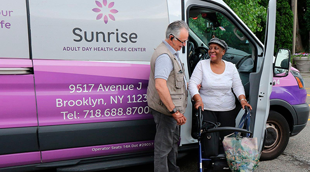 Four Seasons Adult Day Health Care Transportation van with a rider and the driver.