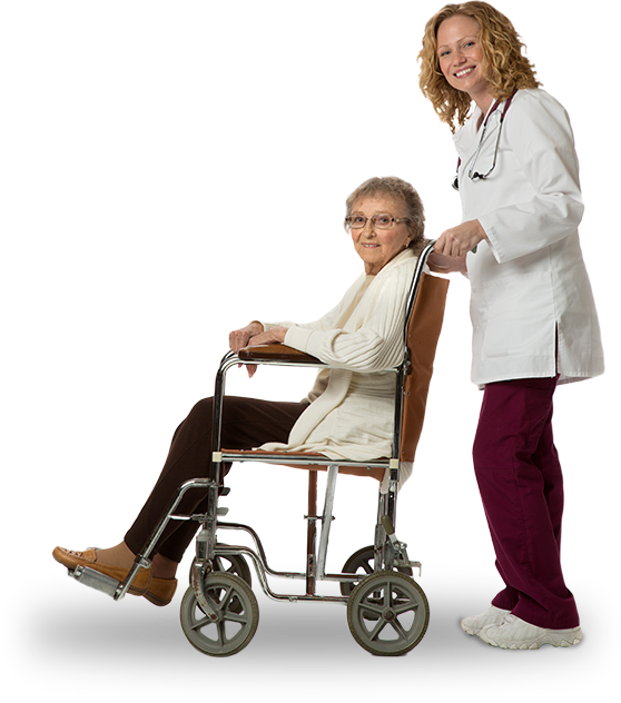 Doctor pushing an older woman in a wheelchair.