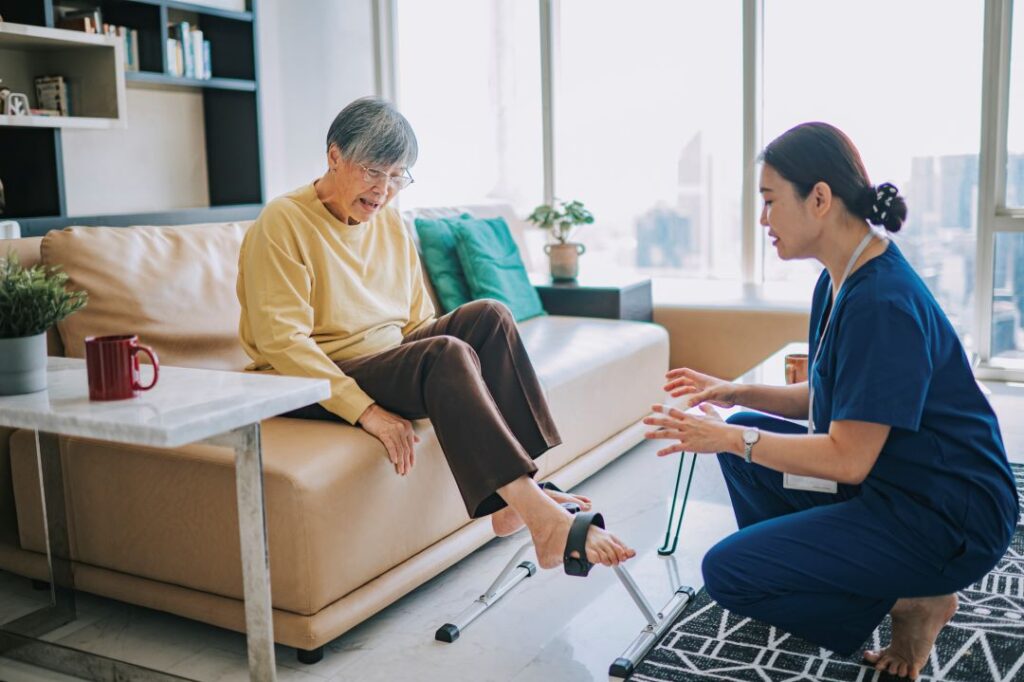 Home health care aide helps her client with wellness goals