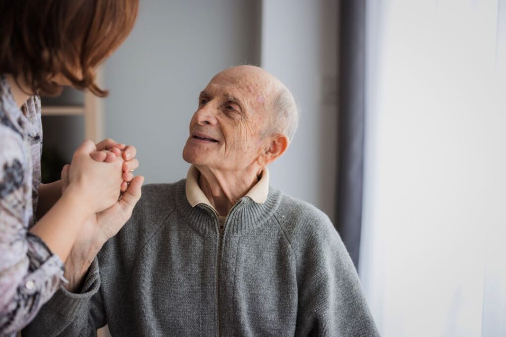 A man with dementia receives care at home.