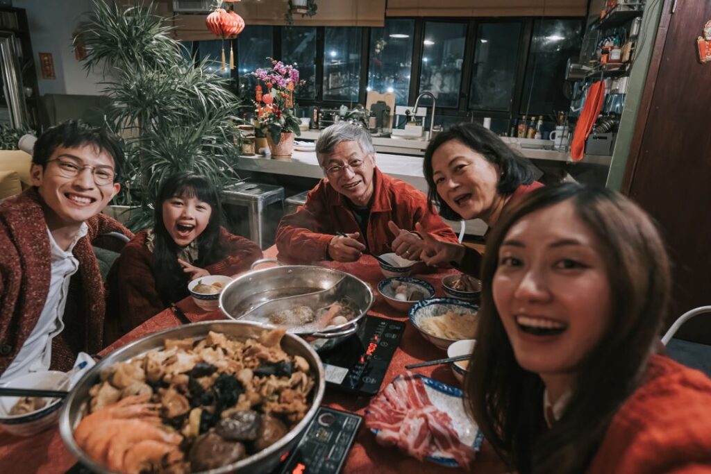 A family takes a selfie as they celebrate the holidays.